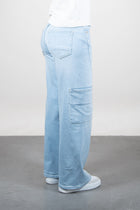 Lola Delicous Wideleg Wide Leg Fit Jeans Light Blue Denim Light Spring Summer. Model wears a Lola in the wash Delicious. It's a wide leg fit. Middle waist height. Premium denim. Comfortable denim. Comfortable jeans. All day wear.