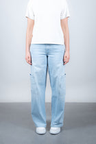 Lola Delicous Wideleg Wide Leg Fit Jeans Light Blue Denim Light Spring Summer. Model wears a Lola in the wash Delicious. It's a wide leg fit. Middle waist height. Premium denim. Comfortable denim. Comfortable jeans. All day wear.