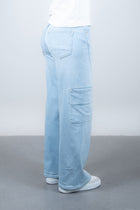 Lola Delicous Wideleg Wide Leg Fit Jeans Light Blue Denim Light Spring Summer. Model wears a Lola in the wash Delicious. It's a wide leg fit. Middle waist height. Premium denim. Comfortable denim. Comfortable jeans. All day wear.