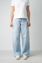 Lola Delicous Wideleg Wide Leg Fit Jeans Light Blue Denim Light Spring Summer. Model wears a Lola in the wash Delicious. It's a wide leg fit. Middle waist height. Premium denim. Comfortable denim. Comfortable jeans. All day wear.